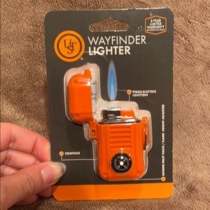 Lighter with compass